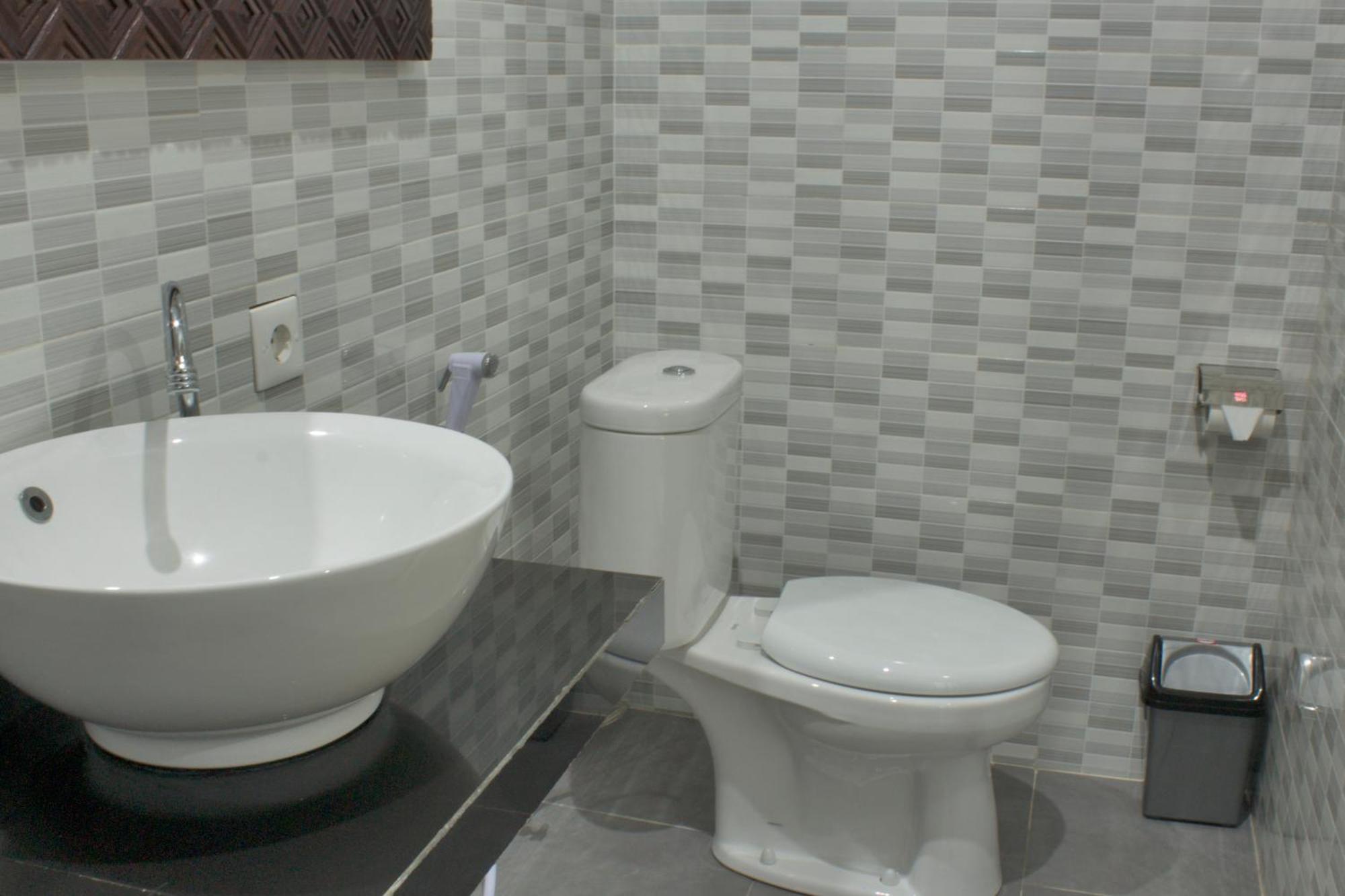Putra Guest House Ubud Quarto foto